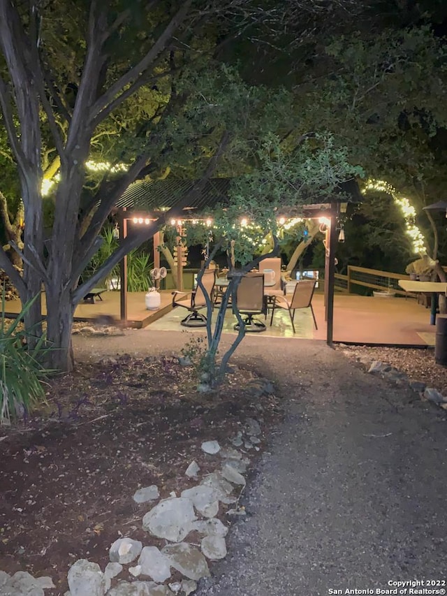 view of property's community featuring a patio area