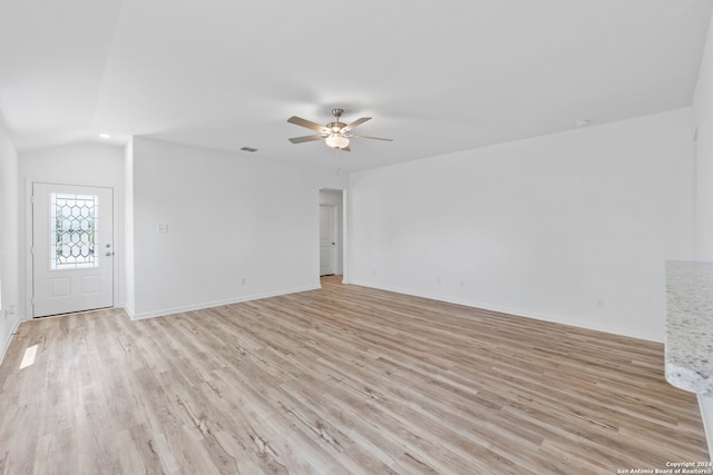 unfurnished living room with lofted ceiling, light hardwood / wood-style flooring, and ceiling fan