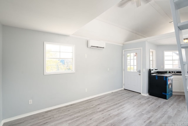 entryway featuring ceiling fan, light hardwood / wood-style floors, a wall mounted air conditioner, and sink