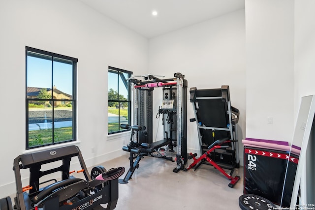 workout area featuring concrete floors