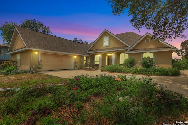 view of front of home featuring a garage