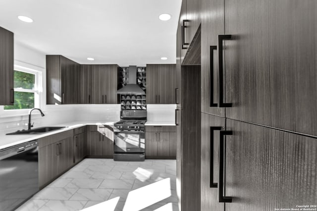 kitchen with sink, dark brown cabinetry, wall chimney exhaust hood, and black appliances