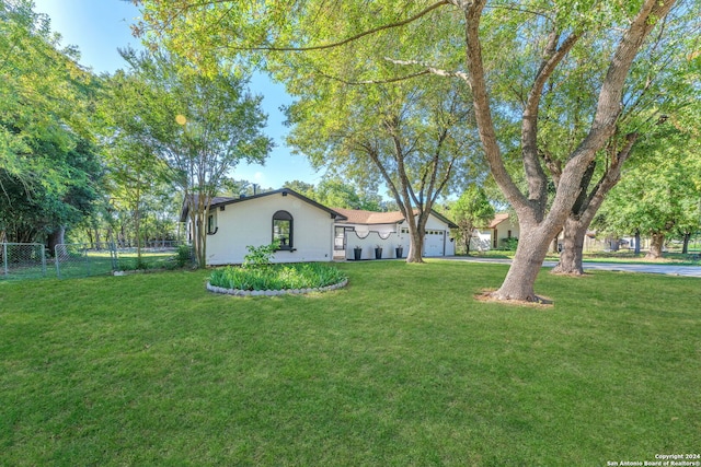 view of yard with a garage