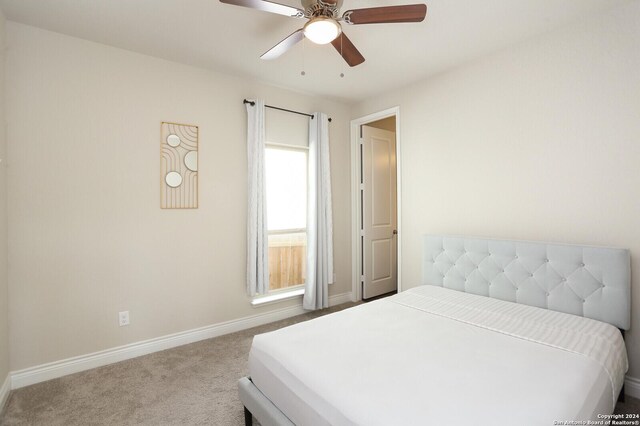 bedroom featuring carpet flooring and ceiling fan