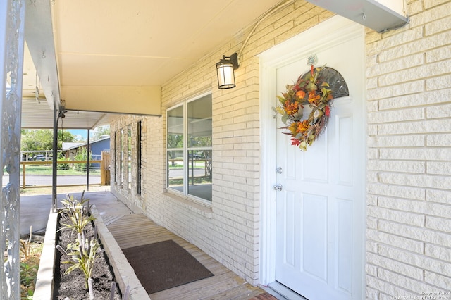 entrance to property with a porch