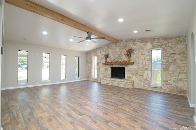 unfurnished living room with a fireplace, a healthy amount of sunlight, and ceiling fan