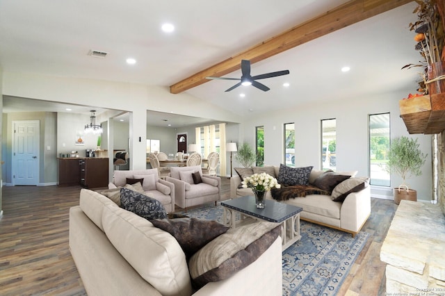 living room with ceiling fan with notable chandelier, lofted ceiling with beams, and dark hardwood / wood-style flooring