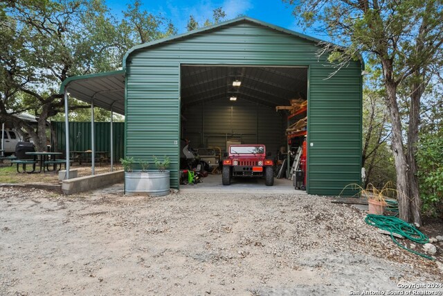 garage with a carport