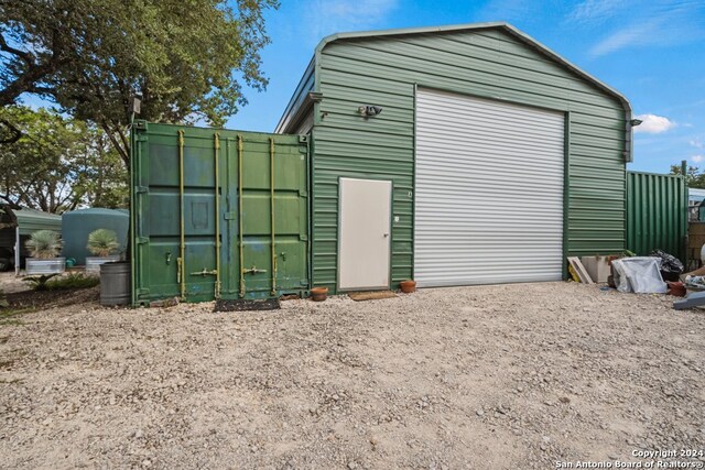 view of outdoor structure featuring a garage