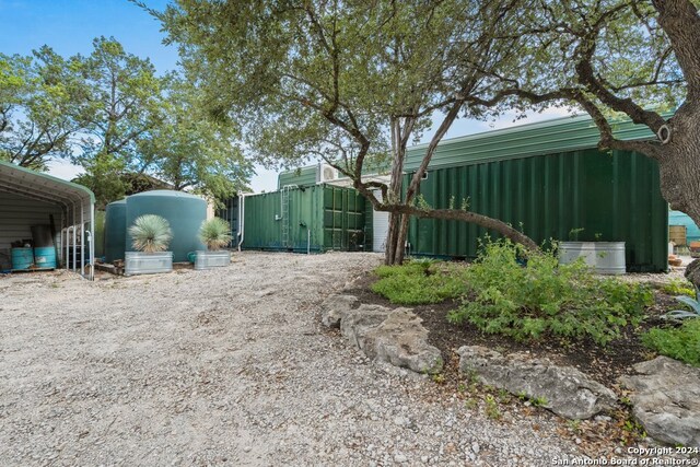 view of yard featuring a carport