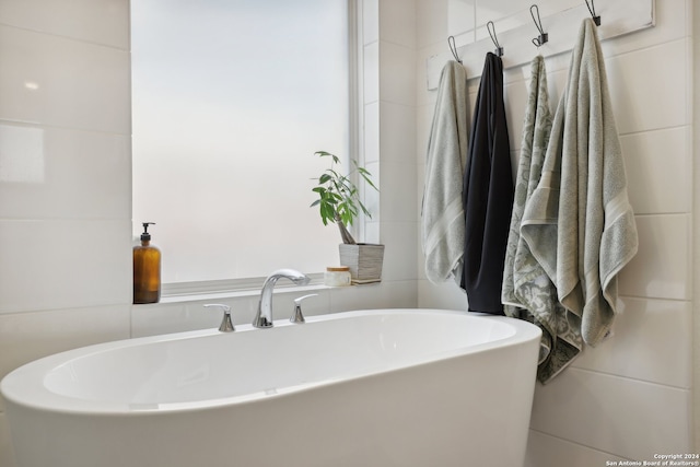 bathroom featuring a bath