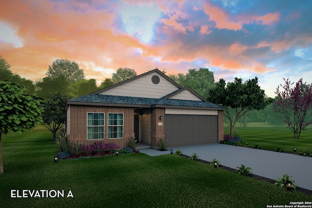 view of front of home featuring a lawn and a garage