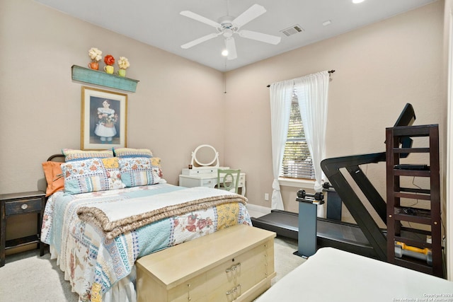 bedroom with light colored carpet and ceiling fan