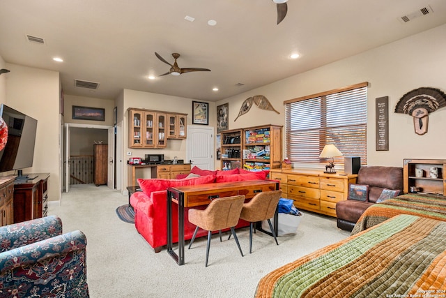 carpeted bedroom featuring ceiling fan