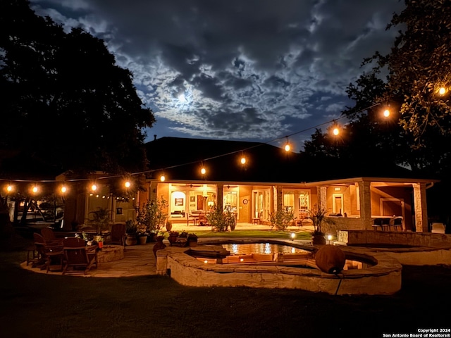 rear view of house featuring a patio