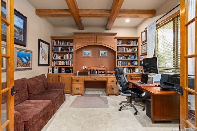 carpeted office space with beam ceiling and coffered ceiling