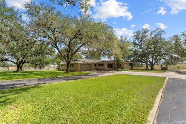 view of front of home with a front lawn