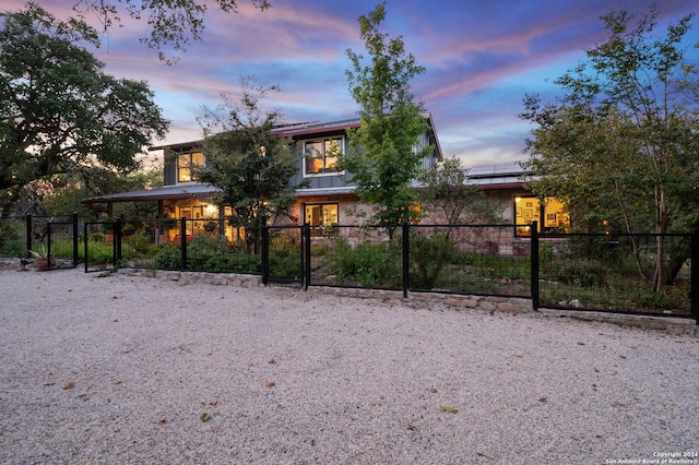 view of yard at dusk