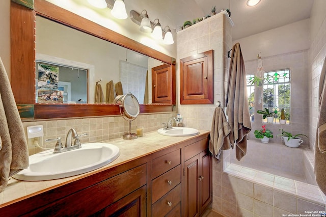 bathroom with vanity and decorative backsplash