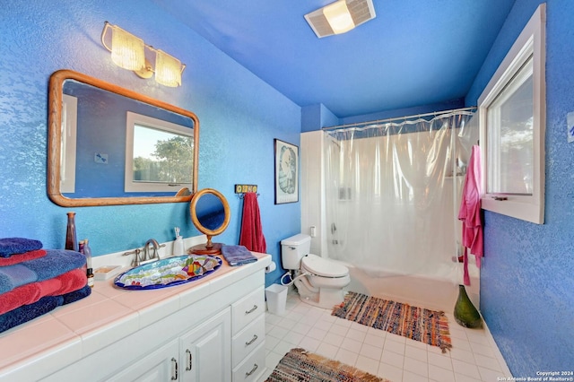 full bathroom with vanity, toilet, shower / tub combo, and tile patterned floors