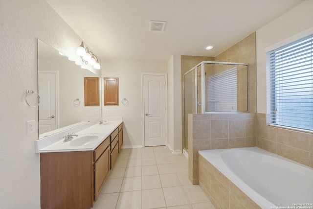 bathroom featuring tile patterned flooring, vanity, and independent shower and bath