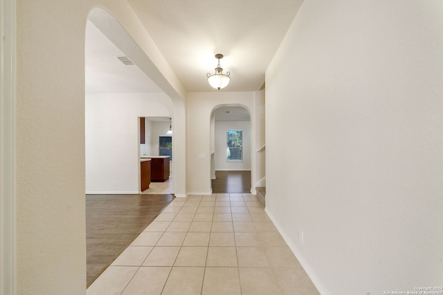 corridor featuring light wood-type flooring