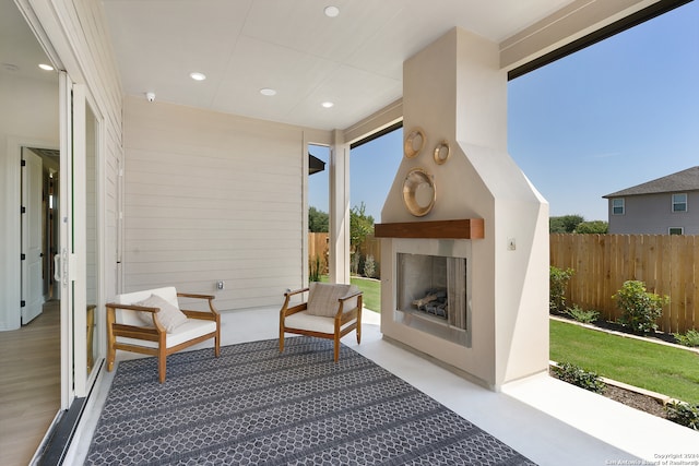 interior space with exterior fireplace