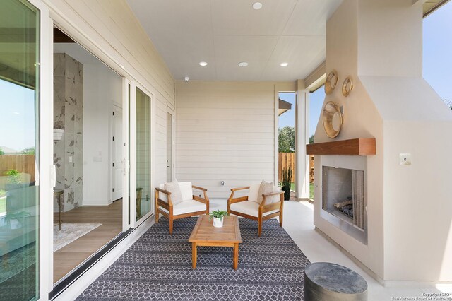 exterior space featuring hardwood / wood-style floors and a wealth of natural light