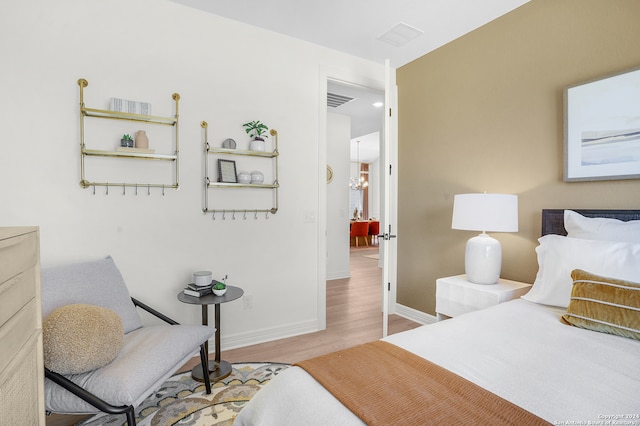 bedroom featuring light hardwood / wood-style floors