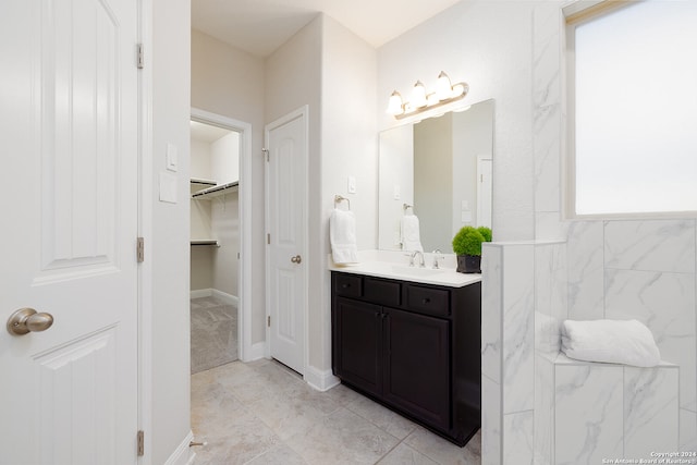 bathroom with vanity and tile patterned floors