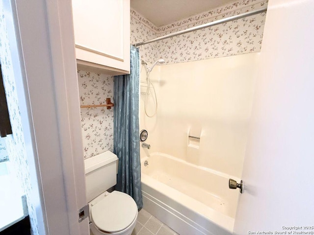 bathroom with shower / tub combo with curtain, toilet, and tile patterned flooring