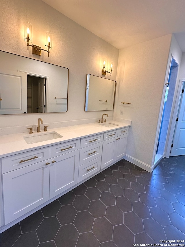 bathroom with vanity and tile patterned floors