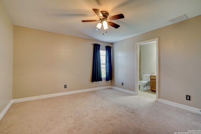 empty room with ceiling fan and light colored carpet