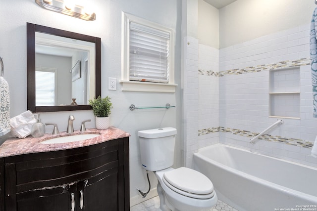 full bathroom with vanity, toilet, and shower / bath combo with shower curtain