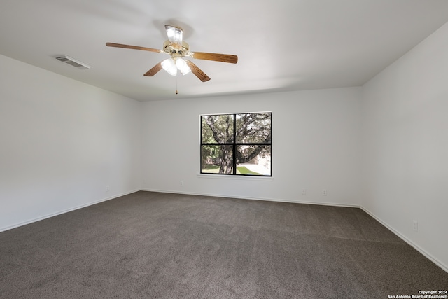 unfurnished room with carpet flooring and ceiling fan