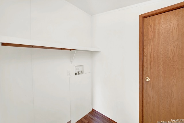 laundry room with hookup for a washing machine and hardwood / wood-style flooring