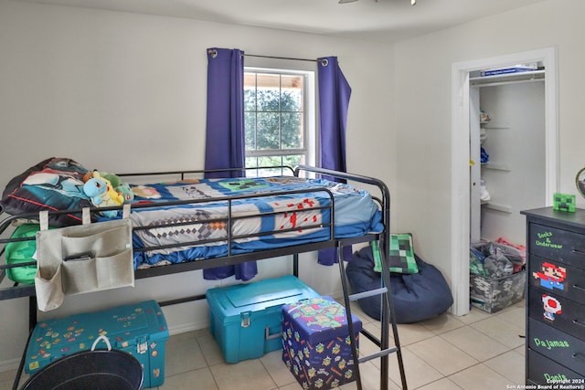 bedroom featuring light tile patterned flooring