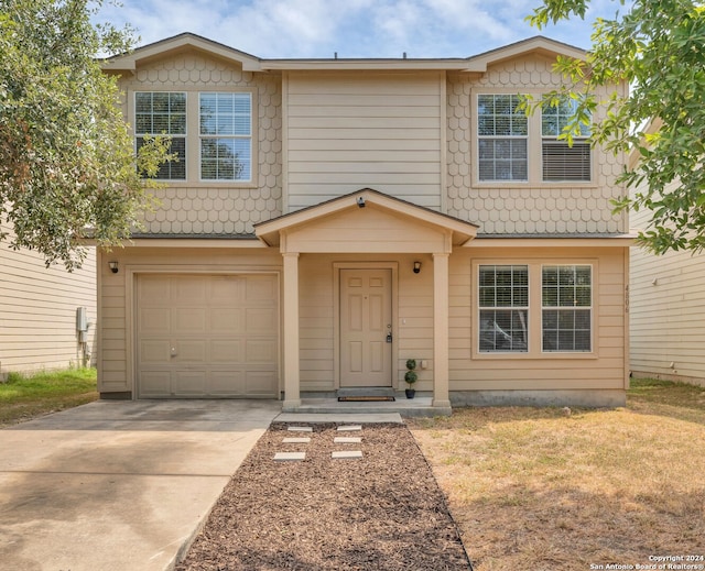 view of front of home with a garage