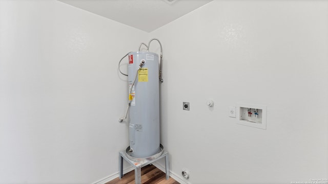 laundry area featuring hookup for a washing machine, wood-type flooring, electric water heater, hookup for an electric dryer, and hookup for a gas dryer