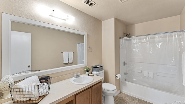 full bathroom with a textured ceiling, vanity, toilet, and shower / tub combo with curtain