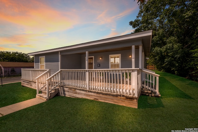 view of front of home featuring a yard