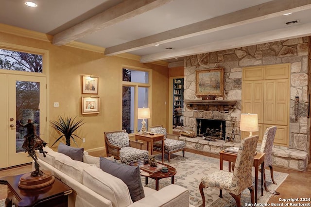 living room with a fireplace and beamed ceiling