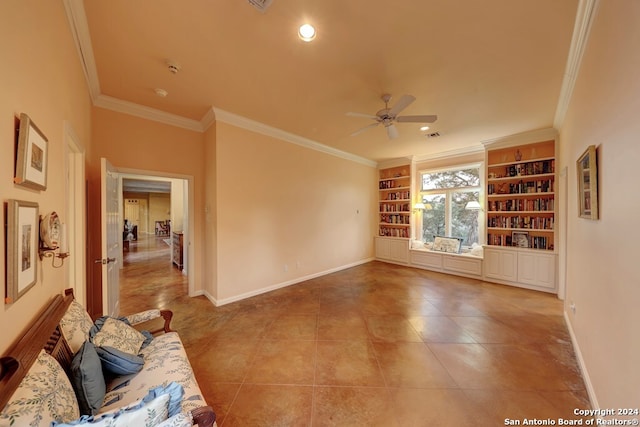 living room featuring built in shelves, crown molding, ceiling fan, and tile patterned flooring