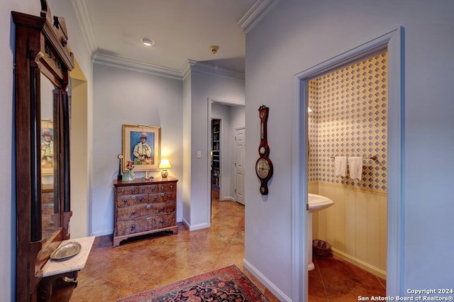 bathroom featuring ornamental molding and tile patterned flooring