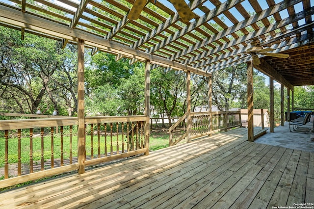 wooden deck featuring a pergola