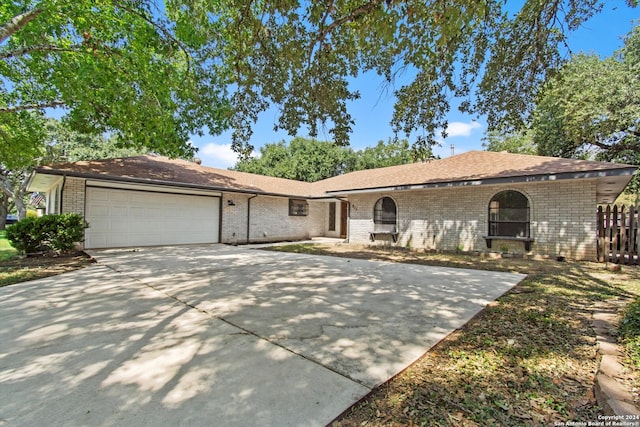 single story home featuring a garage