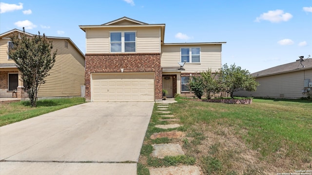 view of front property with a front yard and a garage