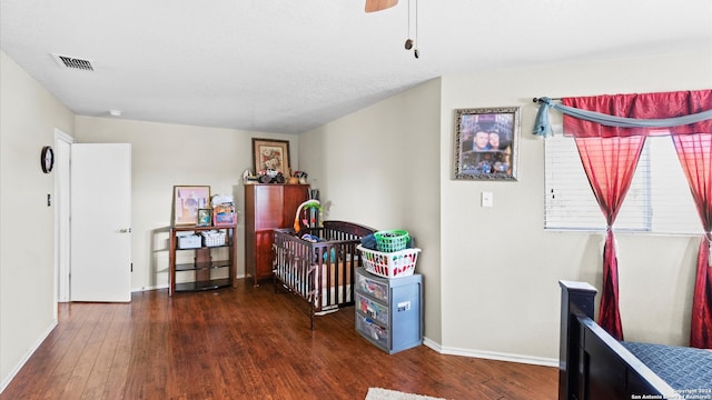 interior space featuring dark hardwood / wood-style floors and ceiling fan