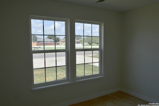 spare room featuring hardwood / wood-style flooring