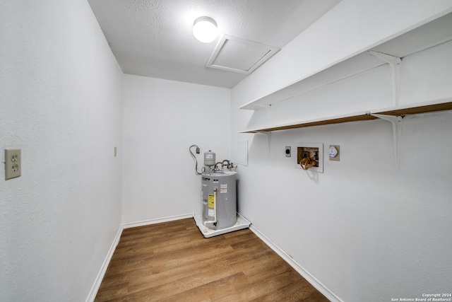 laundry area featuring hookup for a washing machine, wood-type flooring, hookup for an electric dryer, and electric water heater